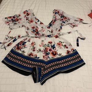 Spring romper. Never worn.